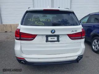 2016 BMW X5 xDrive35i with VIN 5UXKR0C59G0S93024, listed as a IAAI auction lot 42059465 with 121,334 mi miles. Bid and sale history available at carsss.com. Image 17.