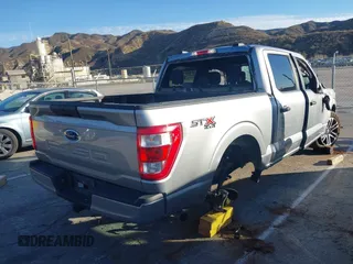 2023 Ford F-150 XL with VIN 1FTFW1E55PKD57059, listed as a IAAI auction lot 41625898 with 49,882 mi miles. Bid and sale history available at carsss.com. Image 4.