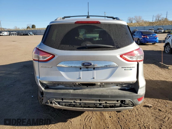 2014 Ford Escape Titanium with VIN 1FMCU9J9XEUB10861, listed as a Copart auction lot 50766115 with 134,469 mi miles and Salvage Title. Bid and sale history available at DreamBid. Image 6.