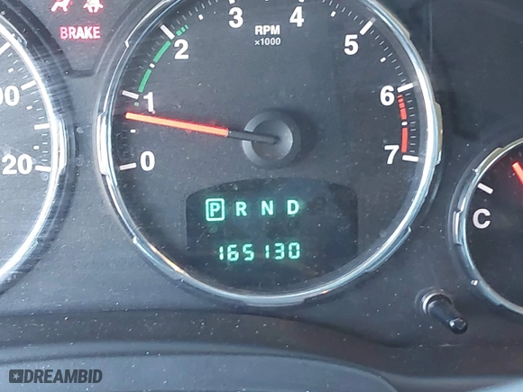 2011 Jeep Liberty Sport with VIN 1J4PP2GK4BW580280, listed as a IAAI auction lot 41482961 with 165,130 mi miles. Bid and sale history available at carsss.com. Image 16.