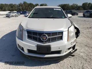 2012 Cadillac SRX Performance Collection with VIN 3GYFNEE33CS659161, listed as a Copart auction lot 76071724 with 149,586 mi miles and Salvage title. Bid and sale history available at DreamBid. Image 4.