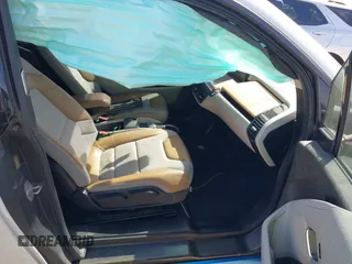 2015 BMW i3 z VIN WBY1Z2C51FV286397, wystawiony jako IAAI lot #41729019 z przebiegiem Nie podano mil oraz . Historia ofert i sprzedaży dostępna na DreamBid. Obrazek 5.