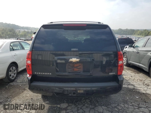 2009 Chevrolet Suburban LT w/1LT with VIN 1GNFK26349R280071, listed as a Copart auction lot 74258504 with 166,122 mi miles and Salvage Title. Bid and sale history available at carsss.com. Image 6.