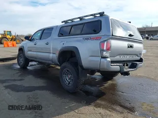 2021 Toyota Tacoma 4WD SR5 with VIN 3TMDZ5BN1MM105694, listed as a IAAI auction lot 41233853 with 1 mi miles. Bid and sale history available at carsss.com. Image 3.