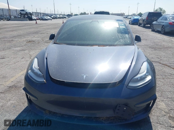 2020 Tesla Model 3 Standard Range Plus z VIN 5YJ3E1EA4LF597181, wystawiony jako IAAI lot #42283159 z przebiegiem 109 993 mil mil oraz . Historia ofert i sprzedaży dostępna na DreamBid. Obrazek 11.