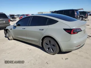 2022 Tesla Model 3 z VIN 5YJ3E1EA5NF124425, wystawiony jako Copart lot #43804405 z przebiegiem 57 412 mil mil oraz Szkoda całkowita • Salvage title. Historia ofert i sprzedaży dostępna na DreamBid. Obrazek 2.
