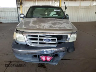 1999 Ford F-150 XL with VIN 1FTZX0722XKA93631, listed as a Copart auction lot 77263794 with Not provided miles and Salvage title. Bid and sale history available at DreamBid. Image 5.