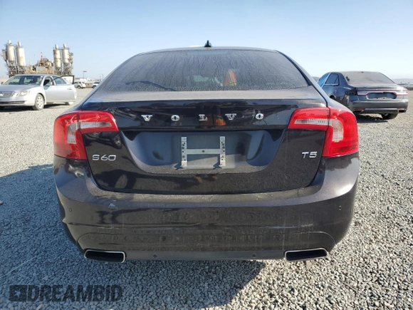 2015 Volvo S60 T5 Drive-E Premier z VIN YV126MFK6F2334600, wystawiony jako Copart lot #61436275 z przebiegiem 117 878 mil mil oraz Czysty tytuł • Clean title. Historia ofert i sprzedaży dostępna na DreamBid. Obrazek 6.