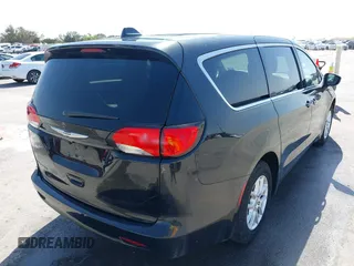 2017 Chrysler Pacifica Touring with VIN 2C4RC1DG6HR501164, listed as a IAAI auction lot 41863304 with 87,705 mi miles and . Bid and sale history available at DreamBid. Image 4.