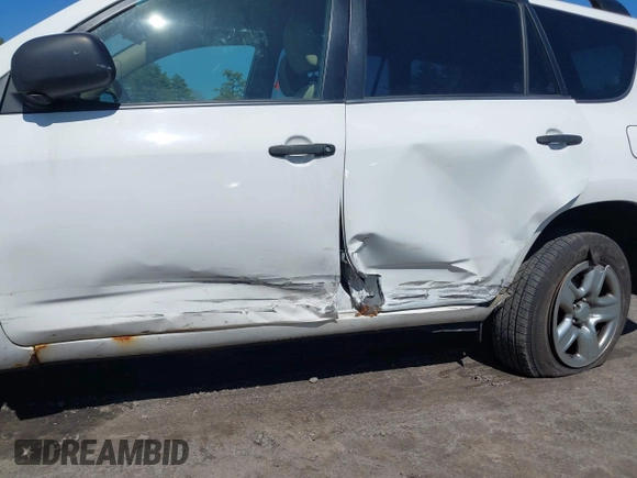 2012 Toyota RAV4 with VIN JTMBF4DV6C5052096, listed as a IAAI auction lot 42001150 with 119,308 mi miles. Bid and sale history available at carsss.com. Image 6.