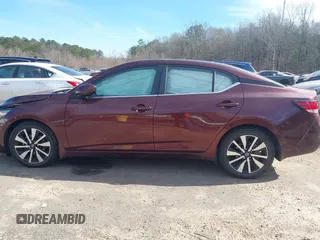 2022 Nissan Sentra SV z VIN 3N1AB8CV5NY221159, wystawiony jako IAAI lot #41322470 z przebiegiem 27 098 mil mil oraz . Historia ofert i sprzedaży dostępna na DreamBid. Obrazek 15.