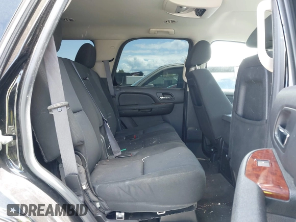 2013 Chevrolet Tahoe LS with VIN 1GNSCAE04DR104790, listed as a IAAI auction lot 42225652 with 119,948 mi miles and . Bid and sale history available at DreamBid. Image 8.