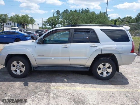 2005 Toyota 4Runner SR5 with VIN JTEBU14R150056589, listed as a IAAI auction lot 42077670 with 115,900 mi miles. Bid and sale history available at carsss.com. Image 14.
