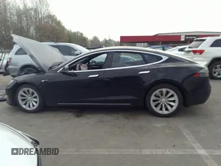 2017 Tesla Model S 60 с VIN 5YJSA1E13HF197109, выставлен на аукционе IAAI как лот 41926033 с пробегом 150 463 миль миль и . История ставок и продаж доступна на DreamBid. Изображение 14.
