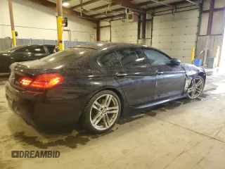 2015 BMW 6 Series 640i xDrive z VIN WBA6B8C58FD453159, wystawiony jako Copart lot #88931285 z przebiegiem 145 656 mil mil oraz Szkoda całkowita • Salvage title. Historia ofert i sprzedaży dostępna na DreamBid. Obrazek 3.