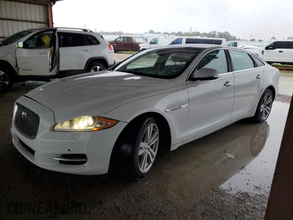 2013 Jaguar XJ Portfolio с VIN SAJWJ2GD4D8V47695, выставлен на аукционе Copart как лот 44997315 с пробегом 195 810 миль миль и Списание • Salvage title. История ставок и продаж доступна на DreamBid. Изображение 1.