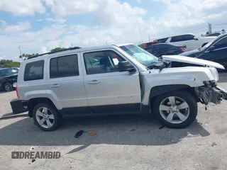 2013 Jeep Patriot Latitude with VIN 1C4NJPFA1DD260398, listed as a IAAI auction lot 41726749 with 146,609 mi miles. Bid and sale history available at carsss.com. Image 13.