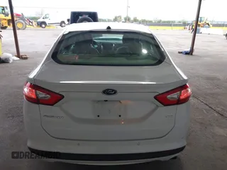 2016 Ford Fusion SE with VIN 3FA6P0H71GR386404, listed as a IAAI auction lot 41974062 with 104,018 mi miles. Bid and sale history available at carsss.com. Image 17.