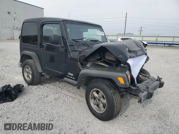 2003 Jeep Wrangler SE with VIN 1J4FA29113P351844, listed as a Copart auction lot 81411324 with 53,525 mi miles and Salvage title. Bid and sale history available at DreamBid. Image 4.