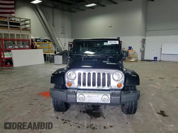2013 Jeep Wrangler Sahara z VIN 1C4AJWBG5DL566559, wystawiony jako Copart lot #54823405 z przebiegiem 134 099 mil mil oraz Szkoda całkowita • Salvage title. Historia ofert i sprzedaży dostępna na DreamBid. Obrazek 13.