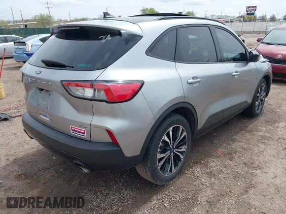 2021 Ford Escape SE Hybrid with VIN 1FMCU0BZ0MUB14085, listed as a IAAI auction lot 41942529 with 34,889 mi miles and . Bid and sale history available at DreamBid. Image 4.