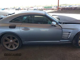 2004 Chrysler Crossfire z VIN 1C3AN69L44X017780, wystawiony jako IAAI lot #42164946 z przebiegiem Nie podano mil oraz . Historia ofert i sprzedaży dostępna na DreamBid. Obrazek 12.
