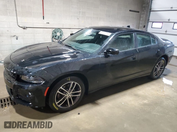 2019 Dodge Charger SXT with VIN 2C3CDXJG1KH757949, listed as a Copart auction lot 82231714 with 75,985 mi miles and Salvage Title. Bid and sale history available at DreamBid. Image 1.