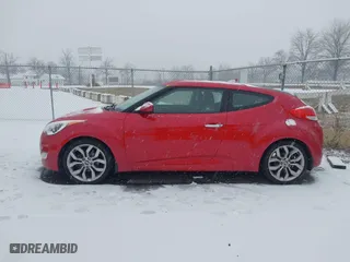 2014 Hyundai Veloster with VIN KMHTC6AD8EU214612, listed as a IAAI auction lot 41258820 with 61,984 mi miles. Bid and sale history available at carsss.com. Image 14.
