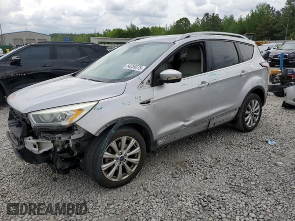 2017 Ford Escape Titanium with VIN 1FMCU0J96HUC12822, listed as a Copart auction lot 54259375 with 127,114 mi miles and Salvage Title. Bid and sale history available at DreamBid. Image 1.