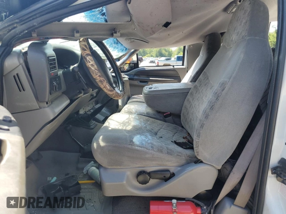 1999 Ford Super Duty F-250 XL with VIN 1FTNX21F3XEA71139, listed as a Copart auction lot 67062114 with 203,233 mi miles and Salvage Title. Bid and sale history available at carsss.com. Image 7.