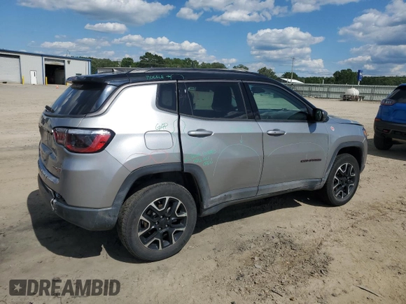 2021 Jeep Compass Trailhawk with VIN 3C4NJDDB5MT571837, listed as a Copart auction lot 58865625 with 75,456 mi miles and Salvage title. Bid and sale history available at DreamBid. Image 3.