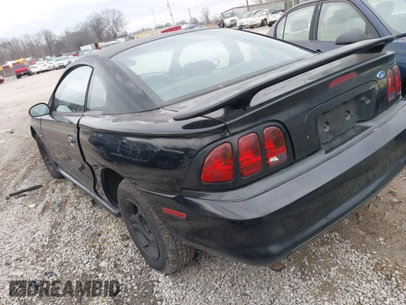 1997 Ford Mustang with VIN 1FALP4041VF129619, listed as a IAAI auction lot 41440766 with 135,934 mi miles. Bid and sale history available at carsss.com. Image 3.