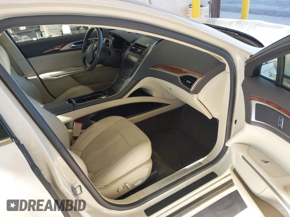 2014 Lincoln MKZ Hybrid с VIN 3LN6L2LU3ER815081, выставлен на аукционе IAAI как лот 42620562 с пробегом 133 377 миль миль и . История ставок и продаж доступна на DreamBid. Изображение 5.