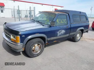 1991 Dodge Dakota z VIN 1B7GG26X3MS259618, wystawiony jako IAAI lot #42316385 z przebiegiem 174 734 mil mil oraz . Historia ofert i sprzedaży dostępna na DreamBid. Obrazek 2.