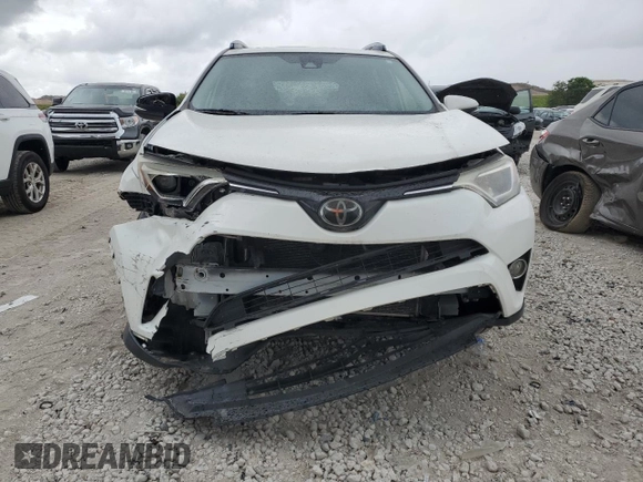2017 Toyota RAV4 XLE with VIN JTMWFREV6HJ109358, listed as a Copart auction lot 55372465 with 163,159 mi miles and Salvage Title. Bid and sale history available at DreamBid. Image 5.