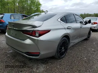 2019 Lexus ES 300h z VIN JTHB21B14K2043342, wystawiony jako Copart lot #57951075 z przebiegiem 93 035 mil mil oraz Szkoda całkowita • Salvage title. Historia ofert i sprzedaży dostępna na DreamBid. Obrazek 3.