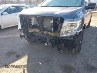 2022 Nissan Titan SV with VIN 1N6AA1EE3NN104176, listed as a IAAI auction lot 41159789 with 53,991 mi miles and . Bid and sale history available at DreamBid. Image 6.