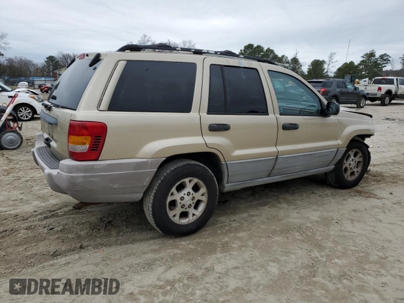 1999 Jeep Grand Cherokee Laredo с VIN 1J4G258S5XC795691, выставлен на аукционе Copart как лот 42556215 с пробегом 320 188 миль миль и Списание • Salvage title. История ставок и продаж доступна на DreamBid. Изображение 3.
