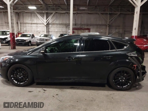 2014 Ford Focus ST with VIN 1FADP3L96EL355713, listed as a IAAI auction lot 41572939 with 102,838 mi miles and . Bid and sale history available at carsss.com. Image 15.