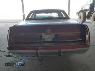 1993 Cadillac Fleetwood z VIN 1G6DW5270PR704750, wystawiony jako Copart lot #88751055 z przebiegiem Nie podano mil oraz Szkody całkowita. Historia ofert i sprzedaży dostępna na DreamBid. Obrazek 6.