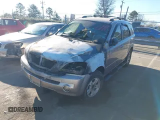 2004 Kia Sorento LX with VIN KNDJC733945268452, listed as a IAAI auction lot 41273839 with 1 mi miles. Bid and sale history available at carsss.com. Image 2.