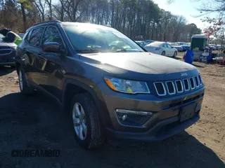 2020 Jeep Compass Latitude with VIN 3C4NJDBB9LT217059, listed as a IAAI auction lot 41645658 with 61,972 mi miles. Bid and sale history available at carsss.com. Image 1.