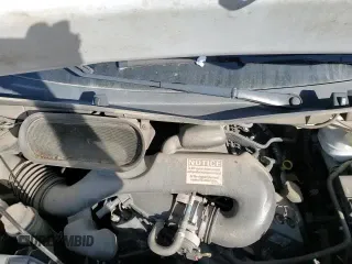 2019 Ford Transit z VIN 1FTYE2CM8KKB69365, wystawiony jako Copart lot #65341925 z przebiegiem 93 869 mil mil oraz Szkoda całkowita • Salvage title. Historia ofert i sprzedaży dostępna na DreamBid. Obrazek 14.