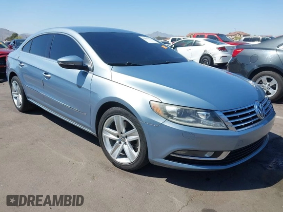 2013 Volkswagen CC Sport with VIN WVWBP7AN0DE567504, listed as a IAAI auction lot 42003695 with 174,528 mi miles. Bid and sale history available at carsss.com. Image 1.