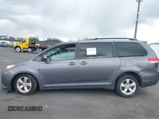 2013 Toyota Sienna LE with VIN 5TDJK3DC1DS049621, listed as a IAAI auction lot 42027930 with 206,148 mi miles and . Bid and sale history available at DreamBid. Image 14.