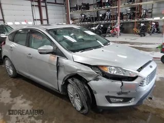 2018 Ford Focus Titanium с VIN 1FADP3N25JL261736, выставлен на аукционе IAAI как лот 41032128 с пробегом 59 142 миль миль и . История ставок и продаж доступна на DreamBid. Изображение 1.