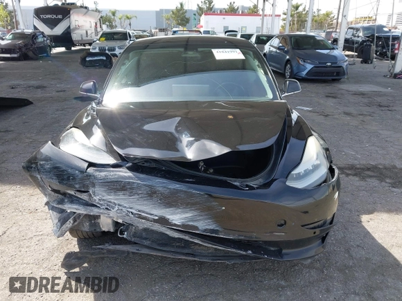 2019 Tesla Model 3 Mid Range with VIN 5YJ3E1EA1KF410297, listed as a IAAI auction lot 41841991 with 176,254 mi miles. Bid and sale history available at carsss.com. Image 12.