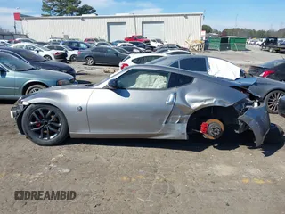 2009 Nissan 370Z Touring z VIN JN1AZ44E19M402223, wystawiony jako IAAI lot #41715048 z przebiegiem 89 123 mil mil oraz . Historia ofert i sprzedaży dostępna na DreamBid. Obrazek 14.