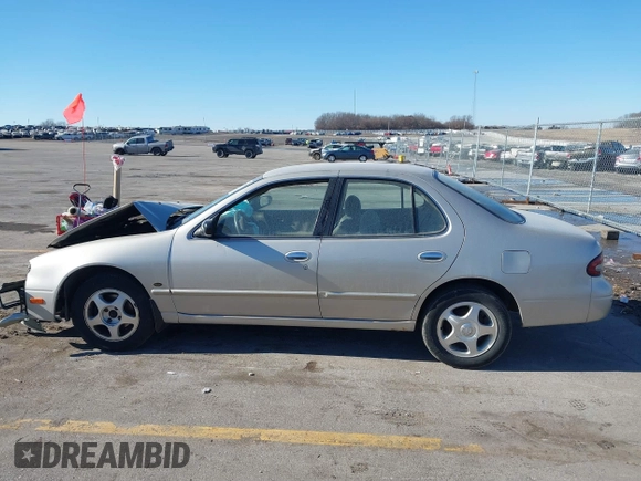 1997 Nissan Altima XE with VIN 1N4BU31D4VC221788, listed as a IAAI auction lot 41356945 with 136,931 mi miles. Bid and sale history available at carsss.com. Image 14.