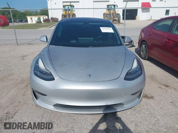 2018 Tesla Model 3 Long Range Battery with VIN 5YJ3E1EB7JF104356, listed as a IAAI auction lot 41936961 with 90,932 mi miles and . Bid and sale history available at DreamBid. Image 13.